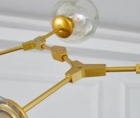 Люстра Молекула золотая на 7 ламп со стеклянными плафонами